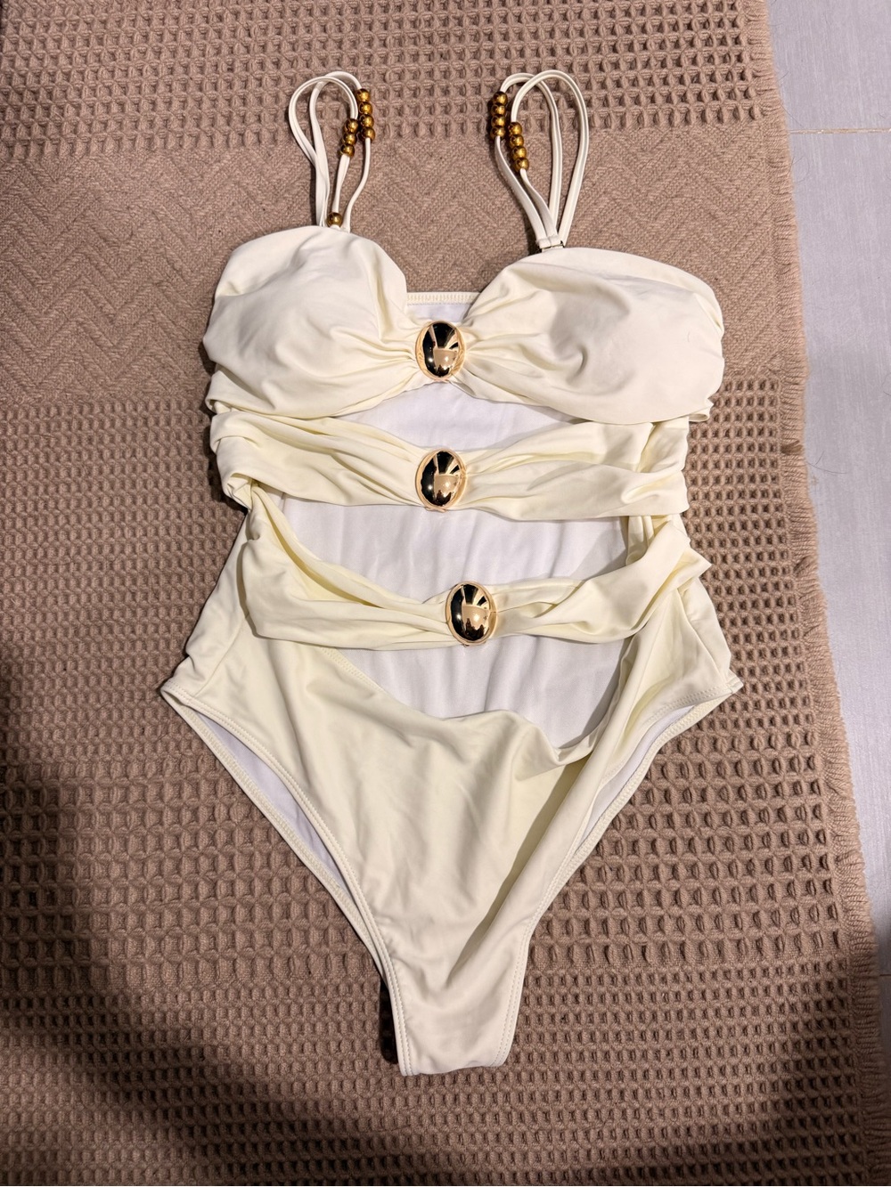Ivory One-Piece Swimsuit with Gold Accents